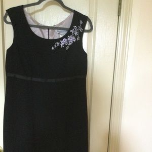 Black lined party dress, empire waist, knee length. Sz 12